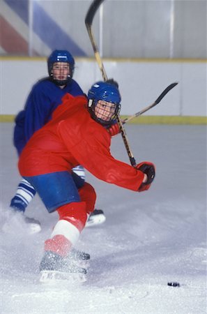simsearch:700-00522757,k - Adolescents qui jouent au Hockey Photographie de stock - Rights-Managed, Code: 700-00152842