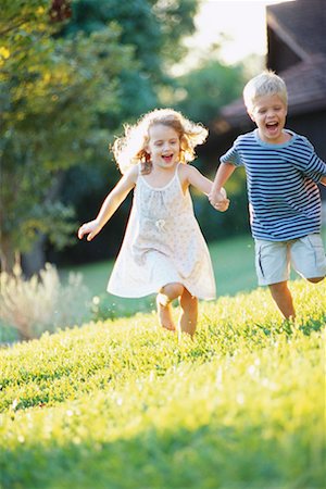 Two Children Running Stock Photo - Rights-Managed, Code: 700-00152915