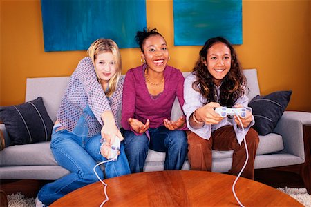 simsearch:700-00038500,k - Teenage Girls Playing Video Games Stock Photo - Rights-Managed, Code: 700-00153107