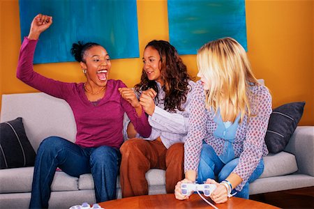 simsearch:700-00038500,k - Teenage Girls Playing Video Games Stock Photo - Rights-Managed, Code: 700-00153109
