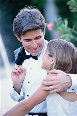 Père et fille en tenues de soirée Photographie de stock - Rights-Managed, Code: 700-00153217