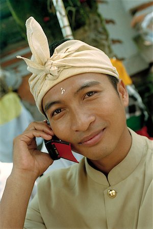 Balinease Man on Cell Phone Ubud, Bali, Indonesia Stock Photo - Rights-Managed, Code: 700-00153589