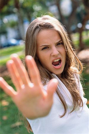 Girl Using Hand Gesture Stock Photo - Rights-Managed, Code: 700-00167133