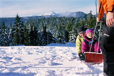 simsearch:700-00069467,k - Children being Pulled on Toboggan Stock Photo - Rights-Managed, Code: 700-00167695