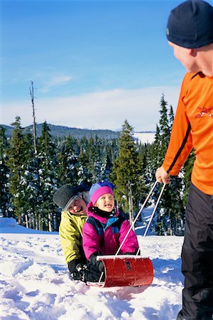simsearch:700-00069467,k - Father Pulling Children on Sled Stock Photo - Rights-Managed, Code: 700-00167696