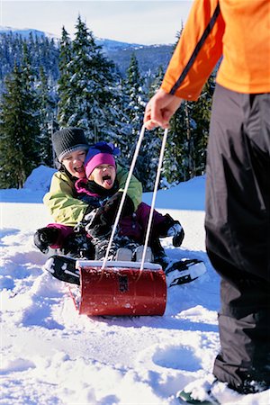 simsearch:700-00069467,k - Father Pulling Children on Sled Stock Photo - Rights-Managed, Code: 700-00167697