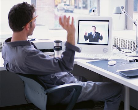 simsearch:700-00168076,k - Businessman Video Conferencing Stock Photo - Rights-Managed, Code: 700-00168078