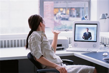 simsearch:700-00168076,k - Businesswoman Video Conferencing Stock Photo - Rights-Managed, Code: 700-00168080