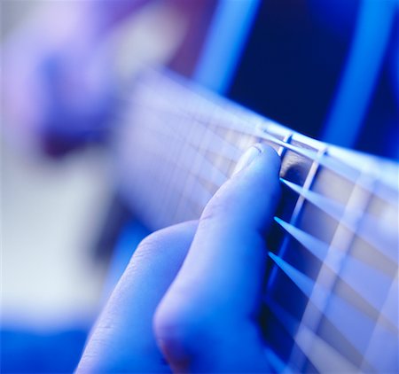 picture of the blue playing a instruments - Close-Up Fingers on Guitar Neck Stock Photo - Rights-Managed, Code: 700-00168230