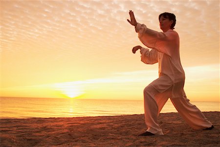 sport or fitness (activity) - Femme faisant le Tai Chi Photographie de stock - Rights-Managed, Code: 700-00161271