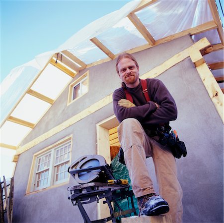 simsearch:700-00404021,k - Portrait of Man by House Construction Stock Photo - Rights-Managed, Code: 700-00161289