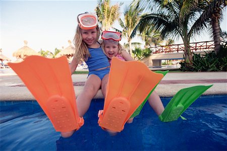 simsearch:700-02314925,k - Two Girls Sitting on Edge of Pool With Snorkel Equipment Stock Photo - Rights-Managed, Code: 700-00161706