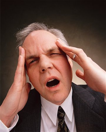 simsearch:700-00088934,k - Businessman with Headache Stock Photo - Rights-Managed, Code: 700-00161924