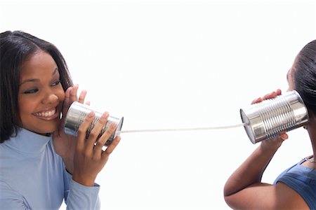 simsearch:700-00025806,k - Two Women Using Tin-Can Telephones Stock Photo - Rights-Managed, Code: 700-00162866
