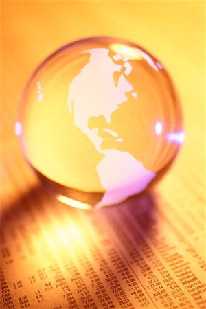 simsearch:700-00618429,k - Globe on Financial Page Stock Photo - Rights-Managed, Code: 700-00162907