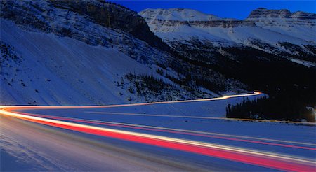 simsearch:700-00089787,k - Streaking Lights on Mountain Road Stock Photo - Rights-Managed, Code: 700-00163059