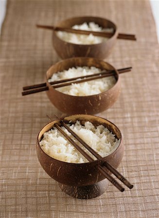 Thai Jasmine Rice in Coconut Bowls Stock Photo - Rights-Managed, Code: 700-00163614