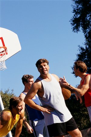 simsearch:700-03519160,k - Men Playing Basketball Foto de stock - Con derechos protegidos, Código: 700-00163954