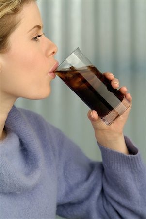 Woman Drinking Soda Stock Photo - Rights-Managed, Code: 700-00177886