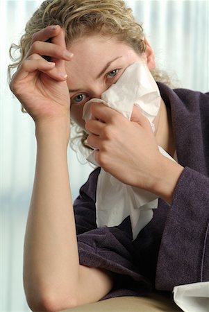 Woman Blowing Nose Stock Photo - Rights-Managed, Code: 700-00177908