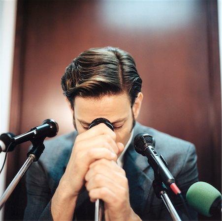 simsearch:700-00088934,k - Businessman Holding Microphone Stock Photo - Rights-Managed, Code: 700-00178715