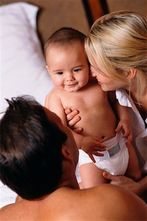 simsearch:700-01582158,k - Mother and Father with Baby Stock Photo - Rights-Managed, Code: 700-00178968