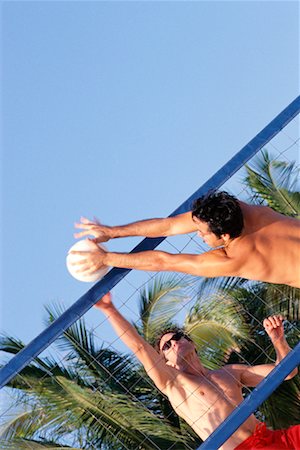 Men Playing Beach Volleyball Stock Photo - Rights-Managed, Code: 700-00178983