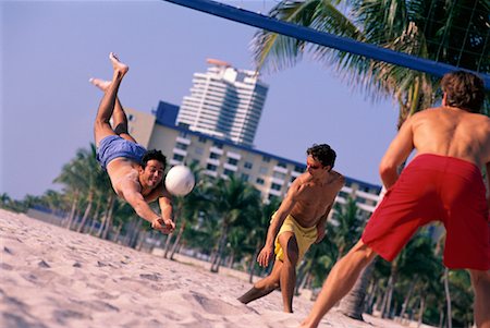 simsearch:632-01155154,k - Men Playing Beach Volleyball Stock Photo - Rights-Managed, Code: 700-00178996