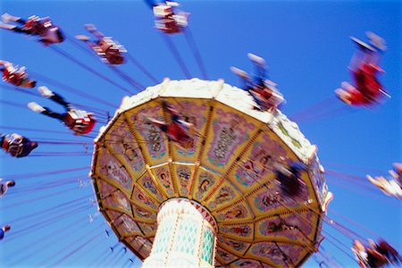 simsearch:700-02990047,k - Swing Ride at Carnival Stock Photo - Rights-Managed, Code: 700-00185120