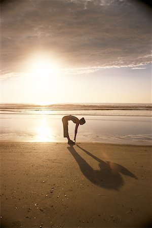 Woman Exercising on Beach Stock Photo - Rights-Managed, Code: 700-00185654