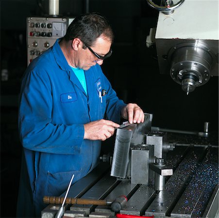 simsearch:700-00404021,k - Man Working in a Factory Stock Photo - Rights-Managed, Code: 700-00186307