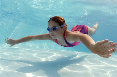 Girl Swimming Underwater Stock Photo - Rights-Managed, Code: 700-00187872