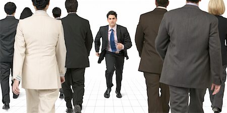 disadvantage - Businessman Running Towards Group of Business People Stock Photo - Rights-Managed, Code: 700-00189773