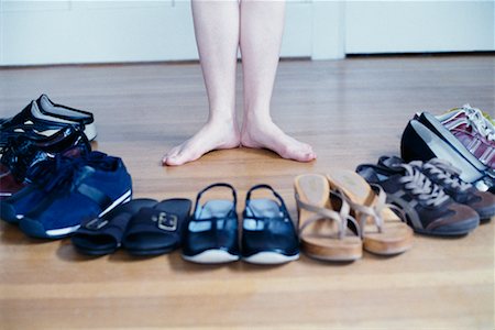 Woman's Feet and Assortment of Shoes Stock Photo - Rights-Managed, Code: 700-00181372