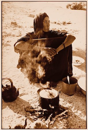Woman Cooking Outdoors Algeria, Africa Stock Photo - Rights-Managed, Code: 700-00183810