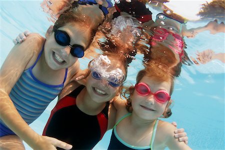 pictures of 10 year old girls swimming - Three Girls Underwater Stock Photo - Rights-Managed, Code: 700-00194280