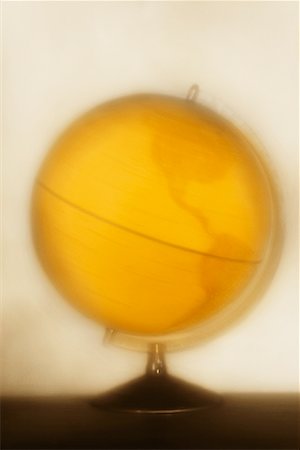 simsearch:700-00618429,k - Yellow Spinning Globe Stock Photo - Rights-Managed, Code: 700-00194283