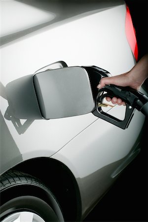 simsearch:6105-05395912,k - Person Pumping Gas Stock Photo - Rights-Managed, Code: 700-00195417