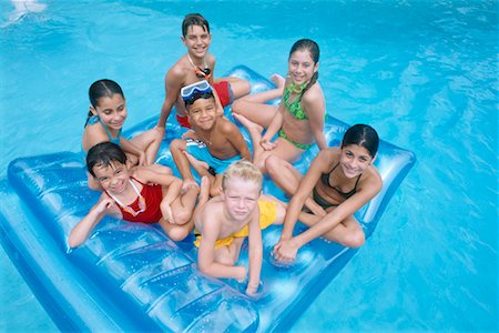 pictures of 10 year old girls swimming - Children in Swimming Pool Stock Photo - Rights-Managed, Code: 700-00195527