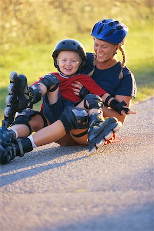 Mother Teaching Son to In-Line Skate Stock Photo - Rights-Managed, Code: 700-00196116