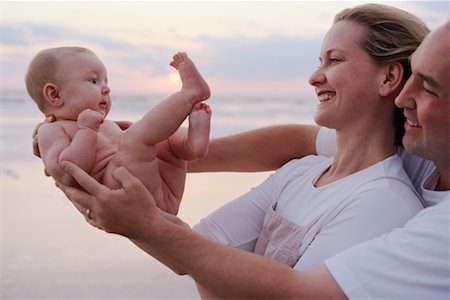 simsearch:700-01582158,k - Couple with Baby on Beach Stock Photo - Rights-Managed, Code: 700-00196413