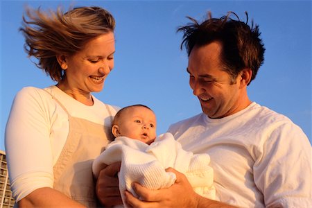 simsearch:700-01582158,k - Couple Holding Baby Stock Photo - Rights-Managed, Code: 700-00196420