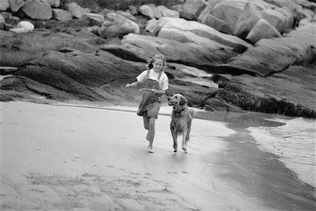 simsearch:700-00092986,k - Girl and Dog on Beach Stock Photo - Rights-Managed, Code: 700-00196904