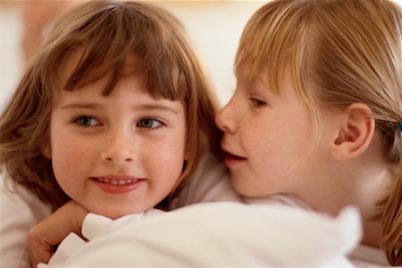 pictures of a little girl whispering - Girls Sharing Secret Stock Photo - Rights-Managed, Code: 700-00197077