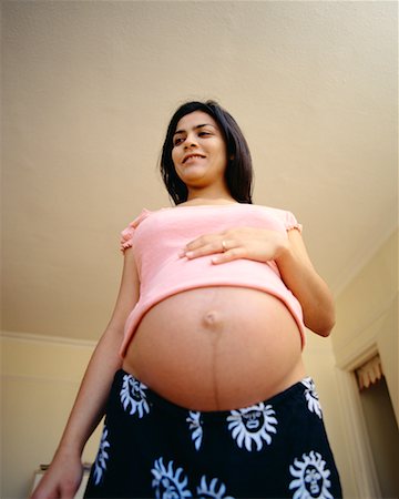 pregnant low angle - Portrait of Pregnant Woman Stock Photo - Rights-Managed, Code: 700-00197179