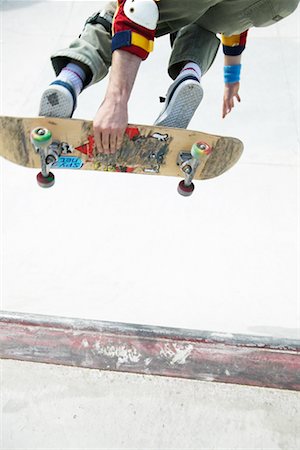 simsearch:400-05737917,k - Skateboarder on Ramp Stock Photo - Rights-Managed, Code: 700-00197335