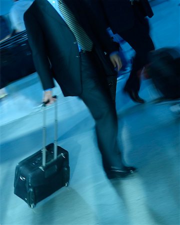 simsearch:695-05773315,k - Businessmen at Airport Stock Photo - Rights-Managed, Code: 700-00197407