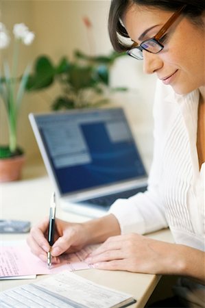 simsearch:700-00085293,k - Woman Paying Bills Stock Photo - Rights-Managed, Code: 700-00198082