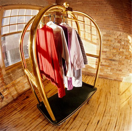 simsearch:700-00029228,k - Shirts Hanging on Rack in Room Stock Photo - Rights-Managed, Code: 700-00198245