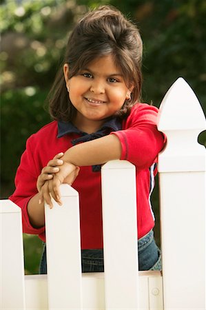 Girl by Fence Stock Photo - Rights-Managed, Code: 700-00198262